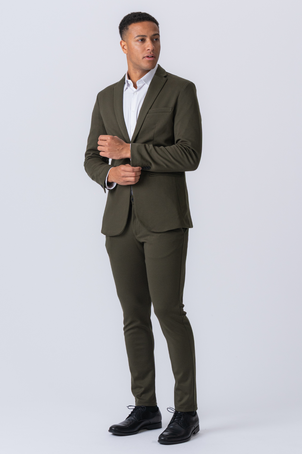 The Original Performance Suit™️ (tummanvihreä) + solmio - pakettitarjous