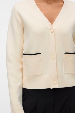 Kultainen V-aukkoinen kontrastineuletakki - koivu W. Musta